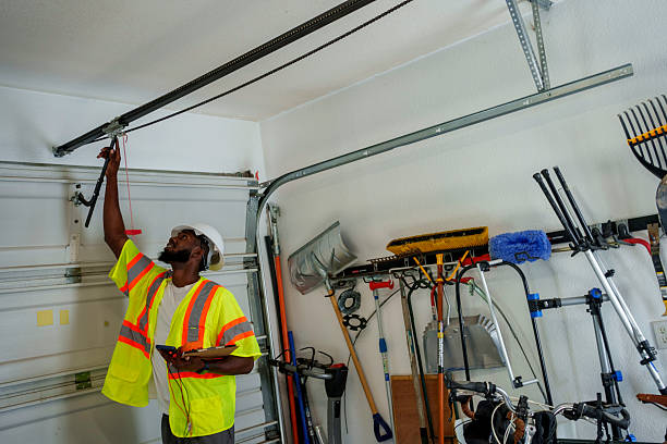 Professional Garage Door Panel Replacement technician working in Garden City Park, NY